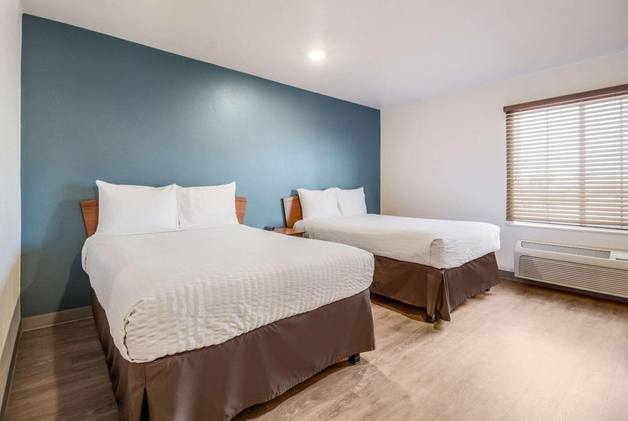 Woodspring Suites Houston باي تاون الغرفة الصورة